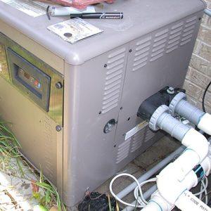 why does my pool heater smell like gas?